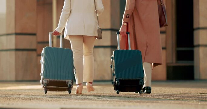 Women, walking and city travel with luggage in Canada for global conference, business work trip or international pitch idea. Teamwork, collaboration or traveling employees with suitcase bags to hotel