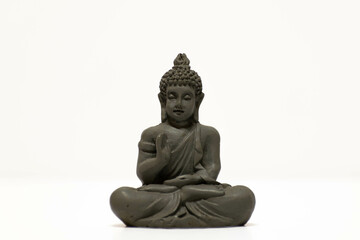 Fototapeta na wymiar statue of buddha on white background