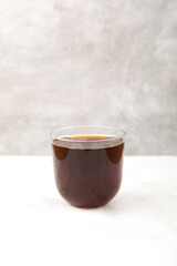 Homemade bread kvass in clear glass, selective focus. Summer carbonated soft drink. Natural probiotic. Traditional cold refreshing drink. Fermented beverage Kvass