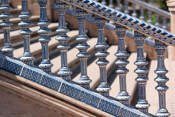 Beautiful andalusian ceramic balustrade foreground and blurred balustrade background in Spain Seville, Andalusia, Spain, Europe 