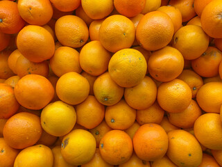 fresh citrus fruits, citrus fruits, which are lined up in the super market, look so fresh and ripe, as background, top view,