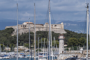 View of the Port Vauban in Antibes with moored sailboats and luxury yachts on the French Riviera in...