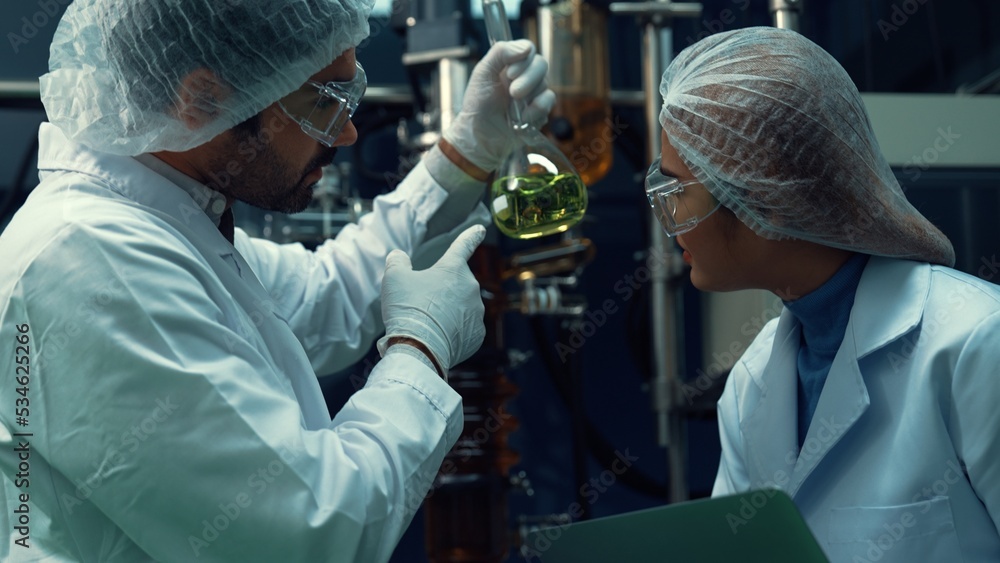 Poster two scientist in professional uniform working in laboratory for chemical and biomedical experiment