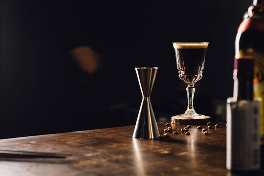 Espresso Martini Cocktail In A Fancy Elegant Glass With Coffee Beans In A Table