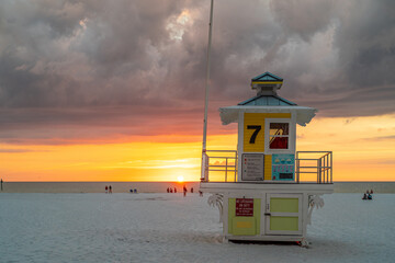 Clearwater Beach Florida. Beach lifeguard station or tower. Clearwater Beach FL. Gulf of Mexico or Ocean. Beautiful colorful sunset. Autumn or fall vacation. Florida Tropical nature.