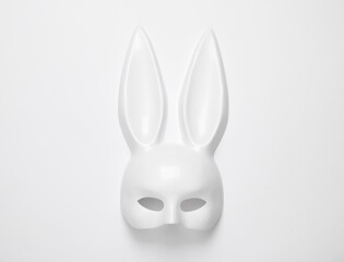 White rabbit mask with long ears from a sex shop on white background © splitov27