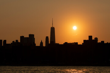 Fototapeta na wymiar Lower Manhattan skyline sunset silhouette