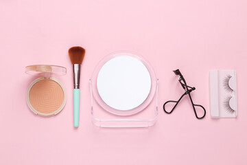 Obraz na płótnie Canvas Beauty care accessories on a pink background. Flat lay composition