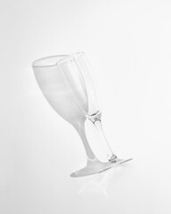 Aesthetic shot of empty champagne glass with long shadow
