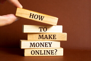 Wooden blocks with words 'How To Make Money Online?'.