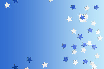 Blue and white star confetti, paper decorations on blue background. 