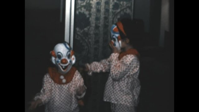 Creepy Clown Costumes 1969 - Siblings dress in matching creepy clown costumes for Halloween in 1969. 