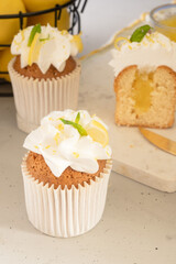 Lemon cupcake with cream and lemon curd
