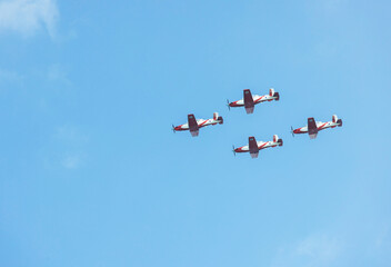 Military aircraft against the blue sky