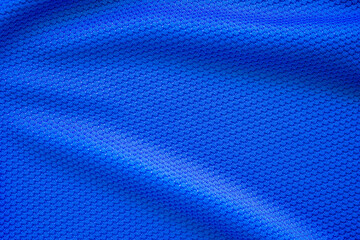 Blue football jersey clothing fabric texture sports wear background, close up top view