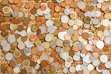 different coins on the white background