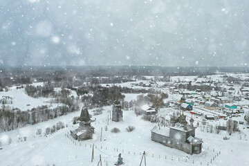 Fototapeta na wymiar wooden church winter top view, landscape russian north architecture