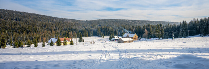 Historical mountain village on sunny winter day