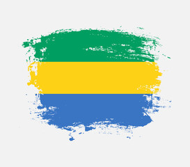 Elegant grungy brush flag with Gabon national flag vector