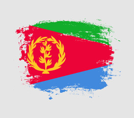 Fototapeta premium Elegant grungy brush flag with Eritrea national flag vector
