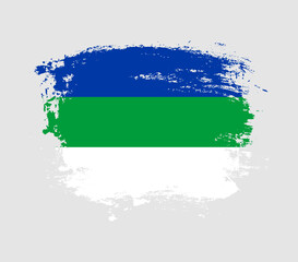 Fototapeta premium Elegant grungy brush flag with Komi Republic national flag vector