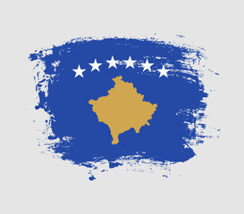Obraz premium Elegant grungy brush flag with Kosovo national flag vector