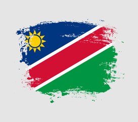 Elegant grungy brush flag with Namibia national flag vector