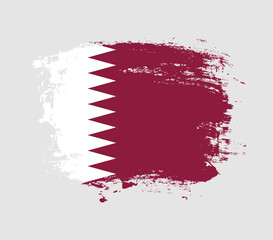 Elegant grungy brush flag with Qatar national flag vector