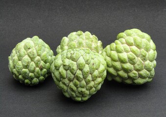 Fototapeta premium Sugar apple on black background 