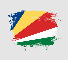 Elegant grungy brush flag with Seychelles national flag vector