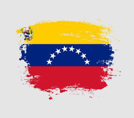 Elegant grungy brush flag with Venezuela national flag vector