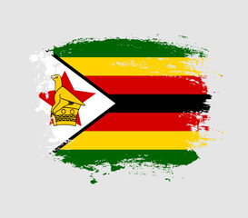 Elegant grungy brush flag with Zimbabwe national flag vector