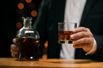 Barman pouring whiskey whiskey glass beautiful night