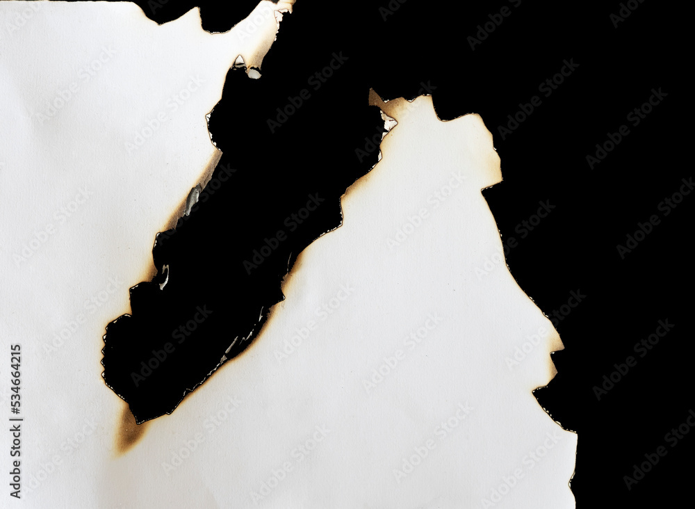 Aufkleber burnt paper frame for texture overlay. damaged white paper with burnt stain background. blank ripped