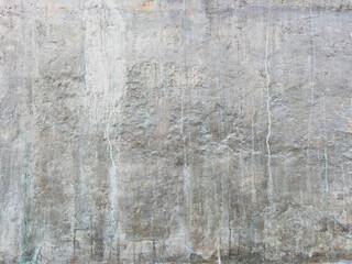 Aged wall background. rough stone texture. cracked and scratched backdrop