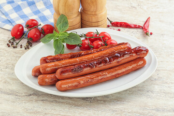 Roasted sausages in the plate