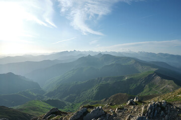 Obraz premium first rays of sun in the mountains of the Pyrenees.