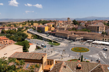 Segovia town view at Plaza del Azoguejo and the ancient Roman aqueduct. Spain 