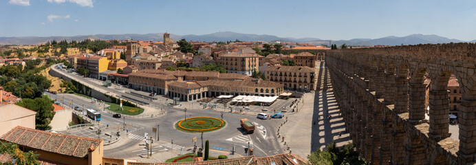 Segovia town view at Plaza del Azoguejo and the ancient Roman aqueduct. Spain 