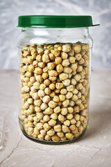 chickpeas in a glass jar on the table