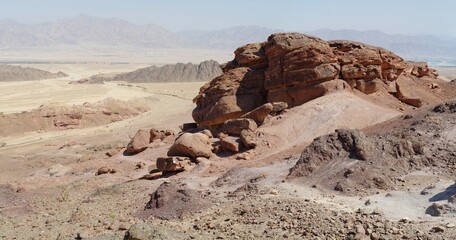 Scenic orange rocks in stone desert near Eilat, Israel