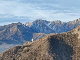 Steeple of Stella, Mount Cuarnan, Mount Chiampon in Julian Prealps in winter