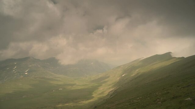 Landscape with moving clouds in Rila mountain, time lapse.
