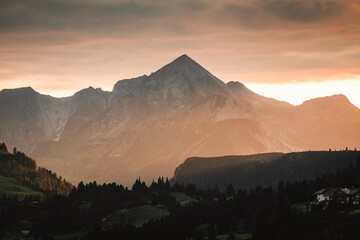 sunset in austria Alps in hohe tauern mountains, golden light in the mountains in Obertauer town