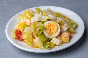 Egg diet salad with lettuce and tomato