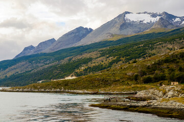 Remote coastline with mountains along the Beagle Channel, Tierra del Fuego, Chile.