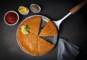 Traditional food of Antakya - Turkey, oruk in the tray. (Turkish name; Tepside icli kofte, tepside oruk, tepsi orugu, sini kofte) Hatay Oruk food.