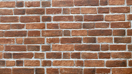 Weathered stained old brick wall