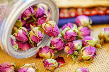 Many naturally dried rose buds on the table