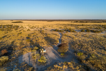 Rental car with rooftop tent -in the Kalahari , Africa